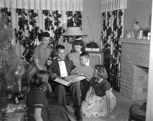 Mayor with the wife and four children. Love those flowered curtains!