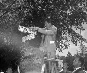 Sign says Todd Avenue and 102nd.