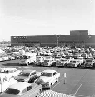 Acres of autos around a box store.