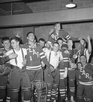 Teenage boys celebrating victory.
